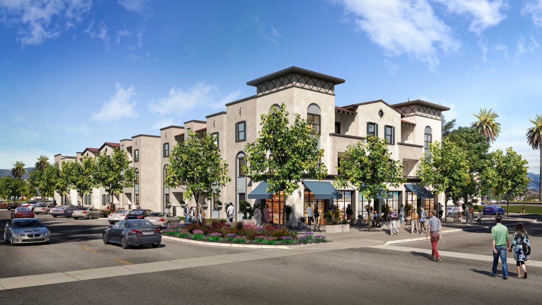 Modern apartment complex with palm trees, shops, people walking, and cars parked outside under blue sky.