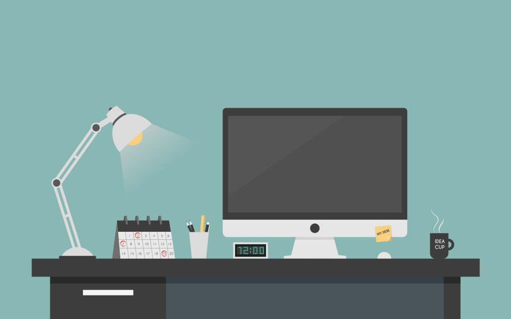 A black desk with a lamp, computer, calendar, clock, and coffee cup on it